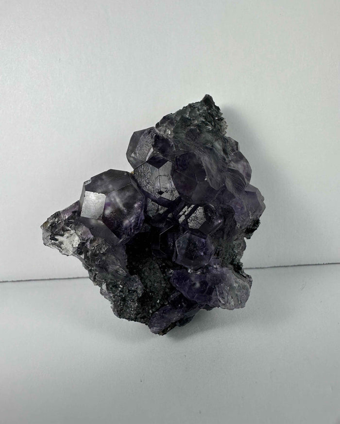 Purple Dodecahedral Fluorite with Calcite on matrix - Smokin Resin Company