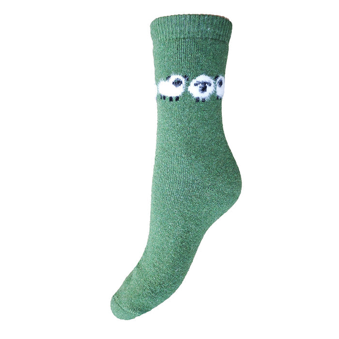 Green sock with fluffy sheep design on a white background