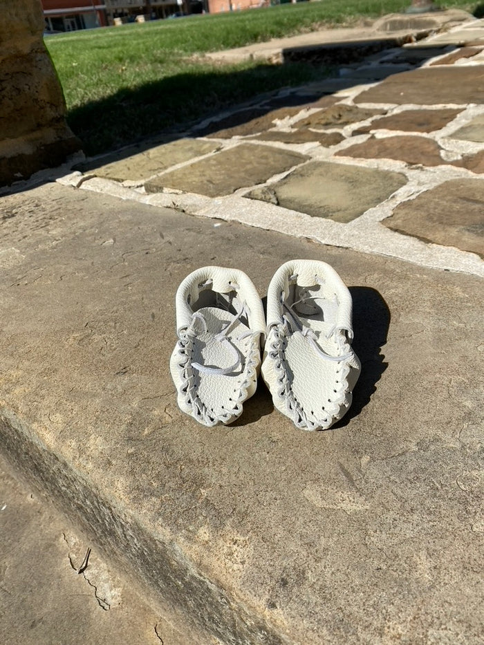 toddler moccasins made by Mvskoke Artist, Soloman Hill