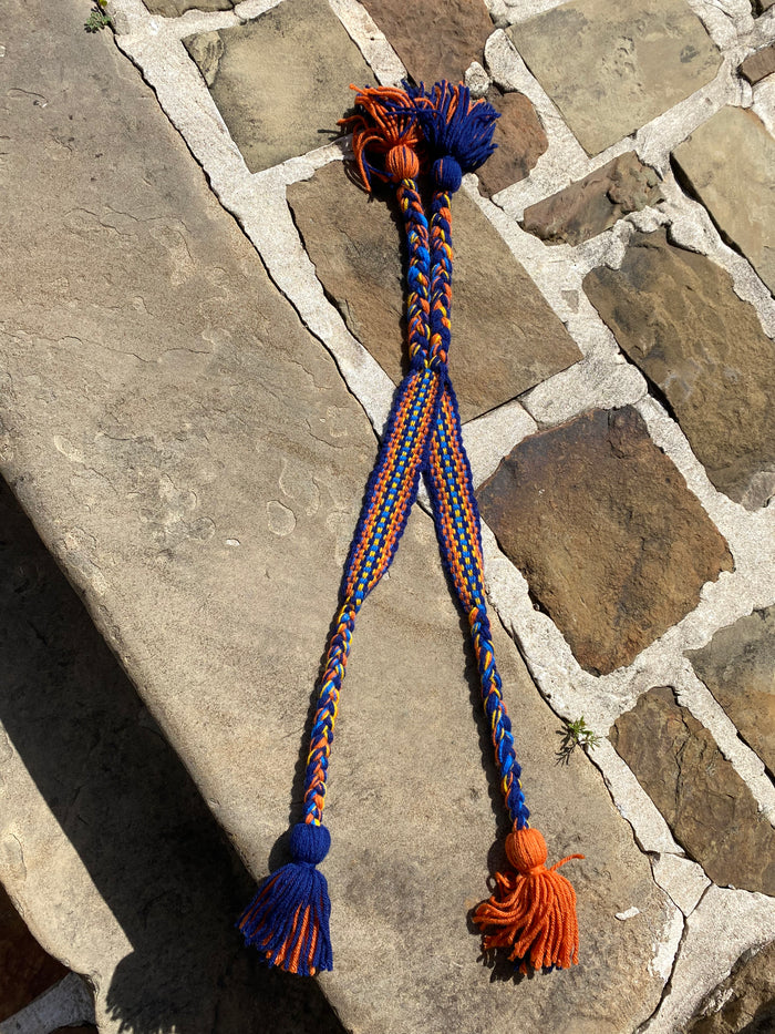 Double strap handwoven yarn belts made by Mvskoke artist, April Harley