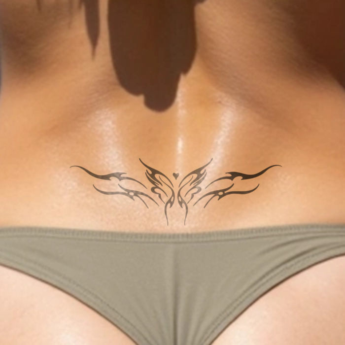 Arschgeweih Schmetterling Tattoo