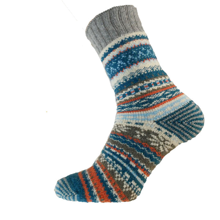 A pair of patterned wool socks with blue, grey, and orange stripes and Scandi patterns.