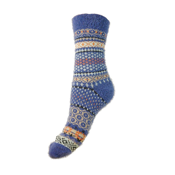 A blue wool sock with Scandi geometric patterns in fawn and rust colors