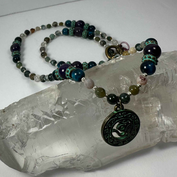Bronze Patina 'Om' Pendant on Mixed Bead Necklace