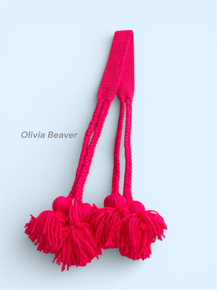 Childrens woven belts made by Olivia Beaver