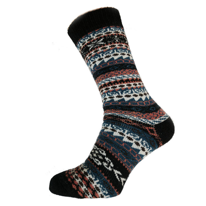 A pair of black, teal, white, and orange Nordic patterned wool blend socks.