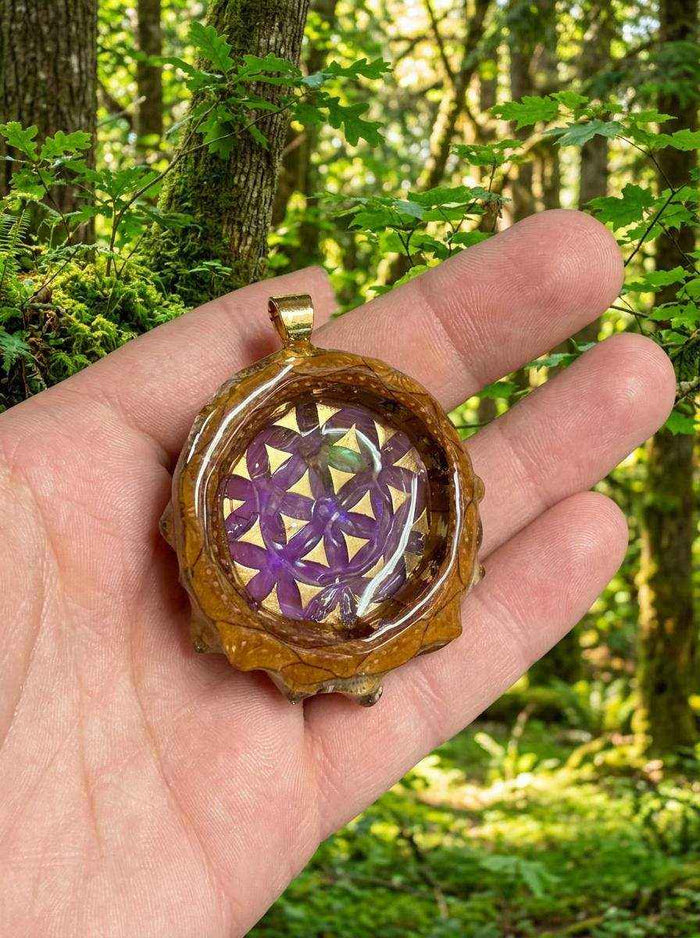 Enhance Your Look with the Unique Gold and Purple Pendant