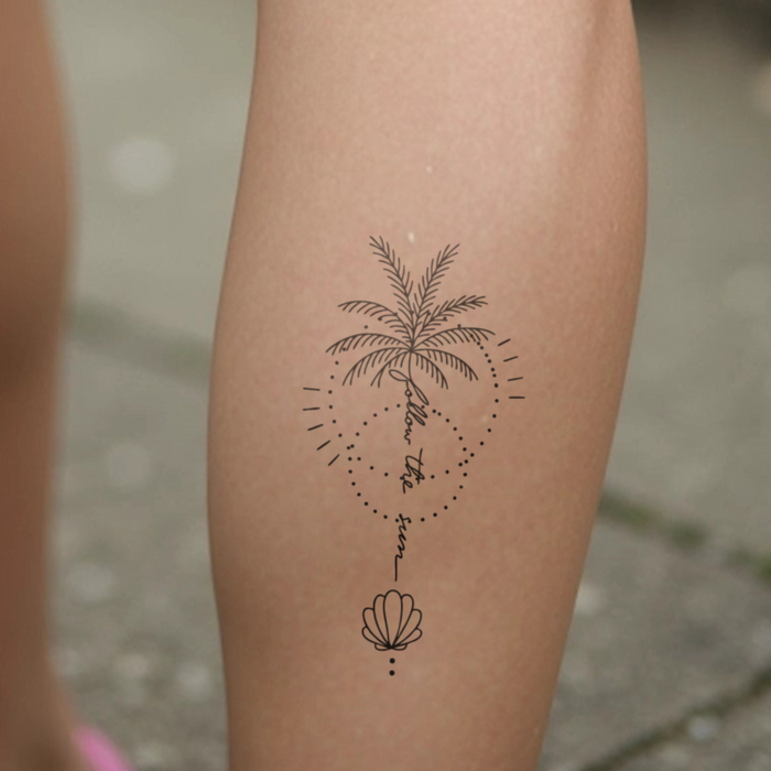folge der Sonne Palme Tattoo