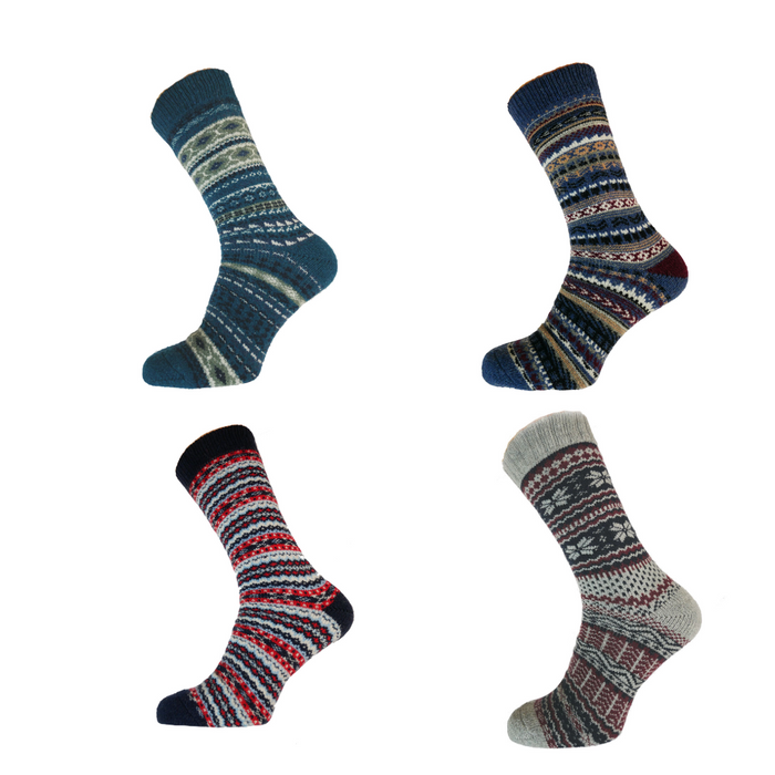 Four pairs of patterned socks on a white background