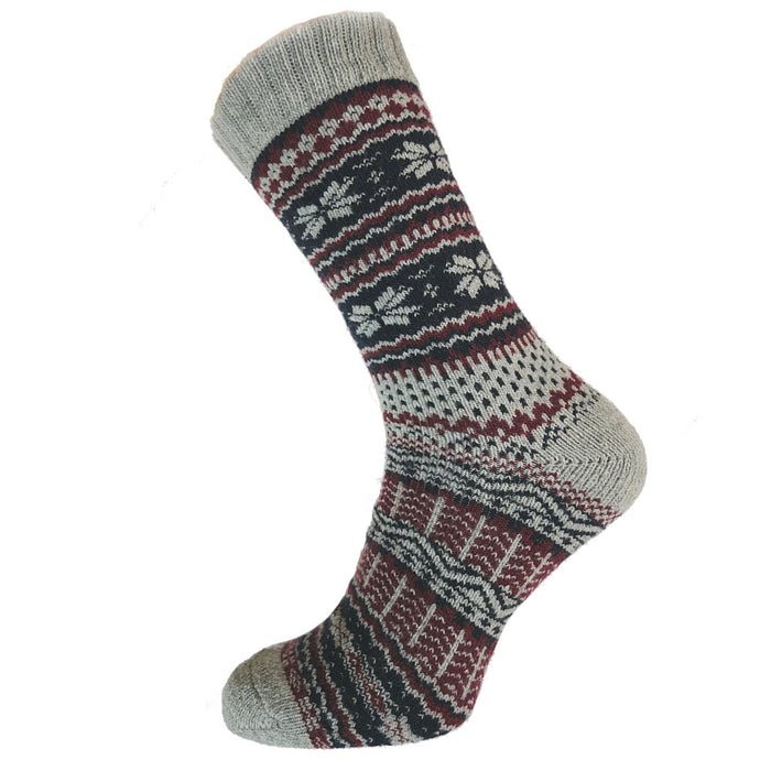 A pair of grey, burgundy, and blue Nordic patterned wool blend socks.