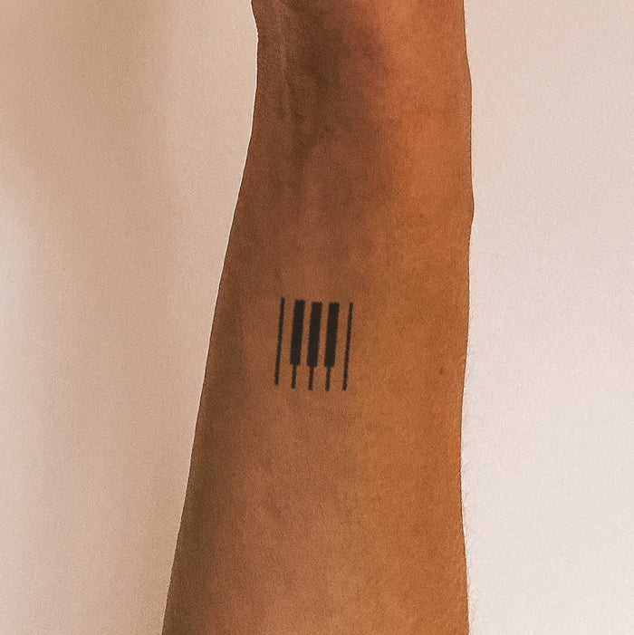 Klaviertasten Tattoo