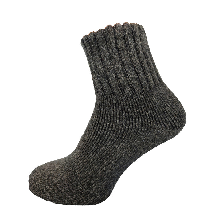 A single dark grey wool blend sock with ribbed cuff.