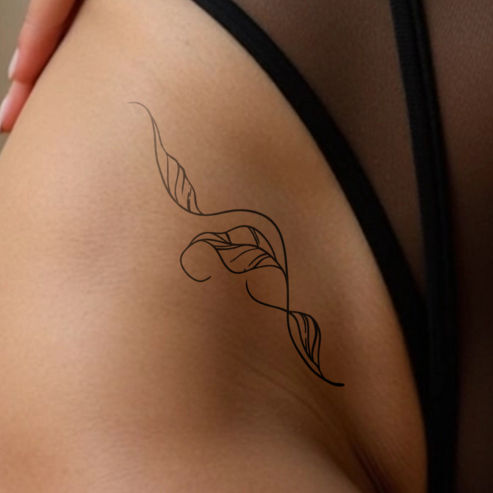 Pflanzenranke Tattoo