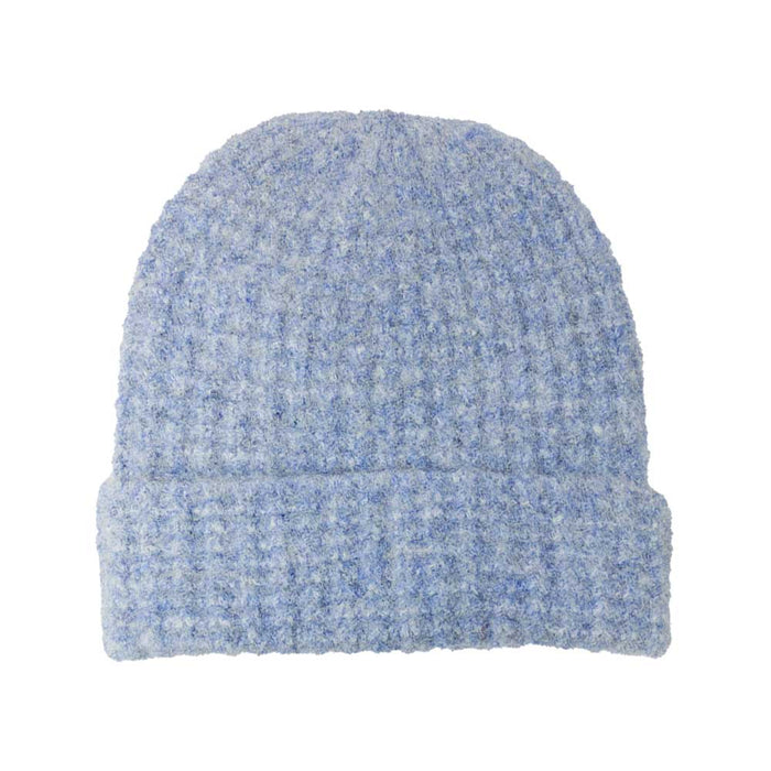 Blue knit beanie on a white background