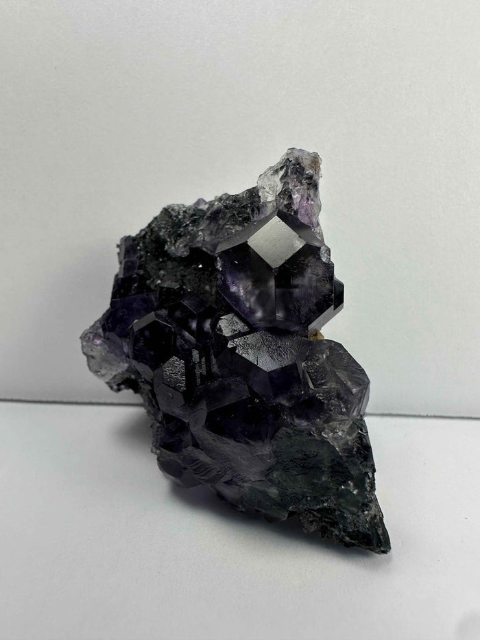 Purple Dodecahedral Fluorite with Calcite on matrix - Smokin Resin Company