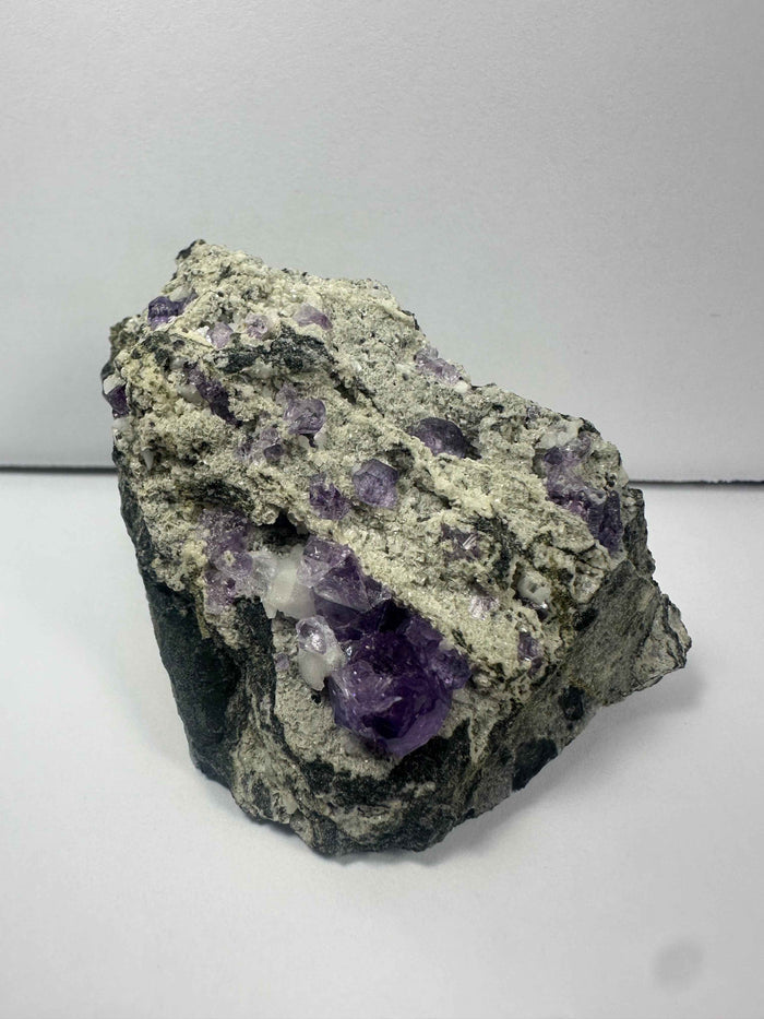 Purple Fluorite Clusters on Matrix - Smokin Resin Company