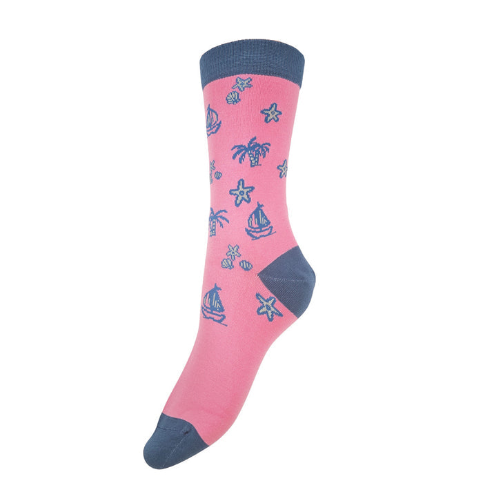 Pink socks with contrasting navy heel toe and cuff with seashells, palm tree and boat motifs