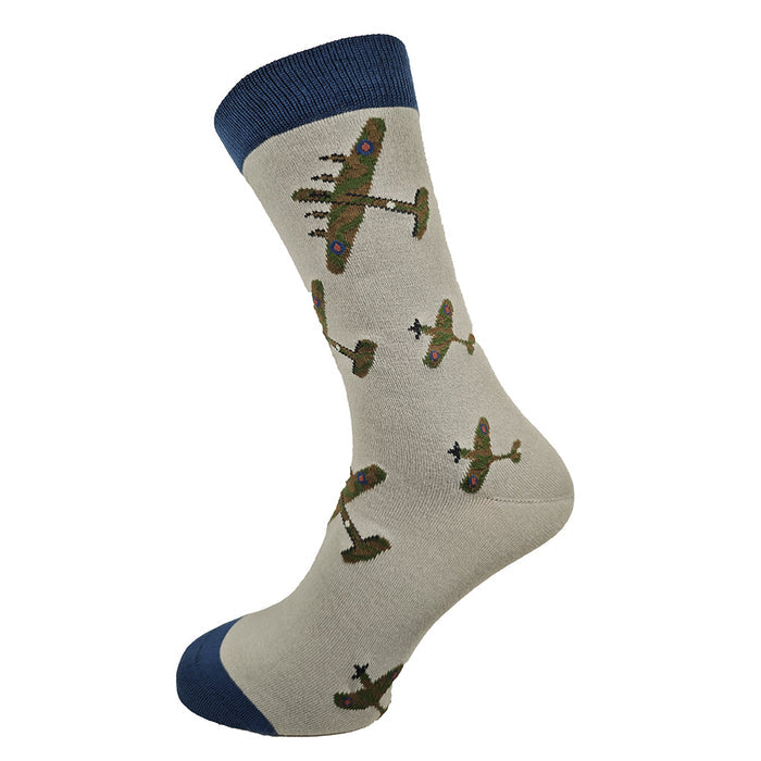 Fawn sock with airplane pattern, contrasting blue toe and cuff, on a plain background