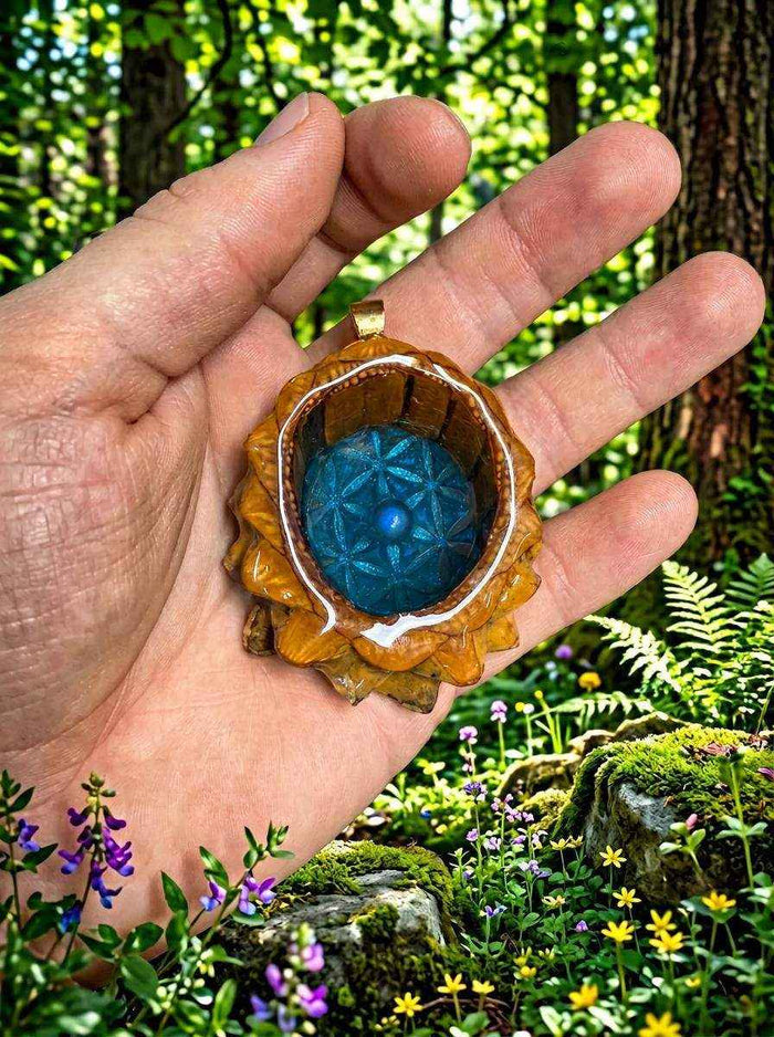 Teal Flower of Life Pendant: Handcrafted Pinecone Charm with Glowing Labradorite